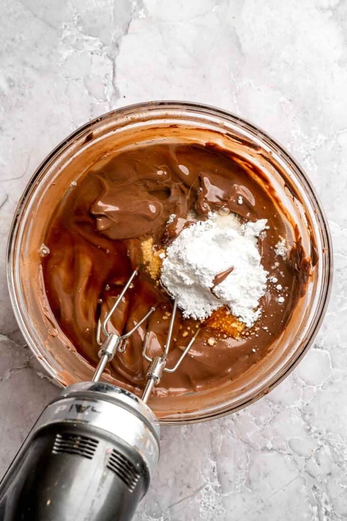 Chocolate mousse cake with rich layers, fluffy mousse, and glossy ganache. Easy, decadent dessert perfect for celebrations and chocolate lovers. | aheadofthyme.com