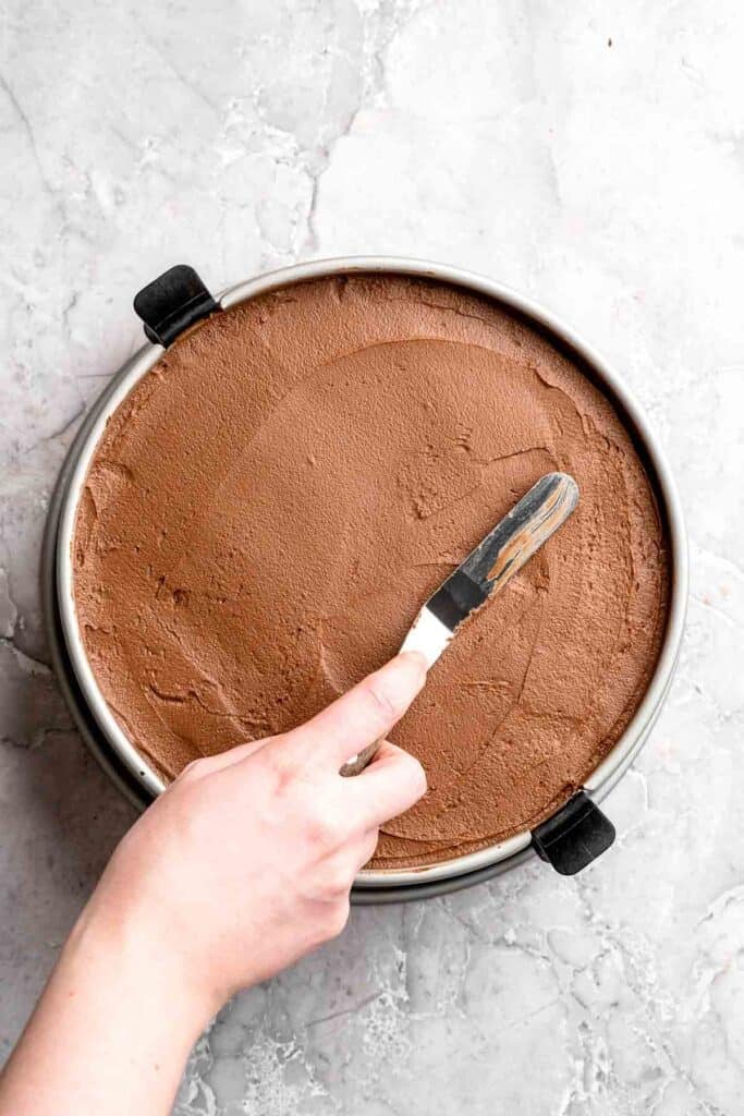 Chocolate mousse cake with rich layers, fluffy mousse, and glossy ganache. Easy, decadent dessert perfect for celebrations and chocolate lovers. | aheadofthyme.com