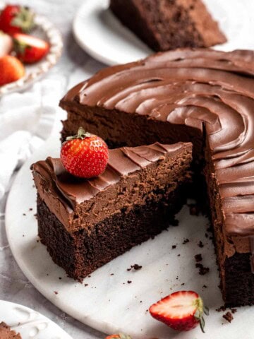 Chocolate mousse cake with rich layers, fluffy mousse, and glossy ganache. Easy, decadent dessert perfect for celebrations and chocolate lovers. | aheadofthyme.com