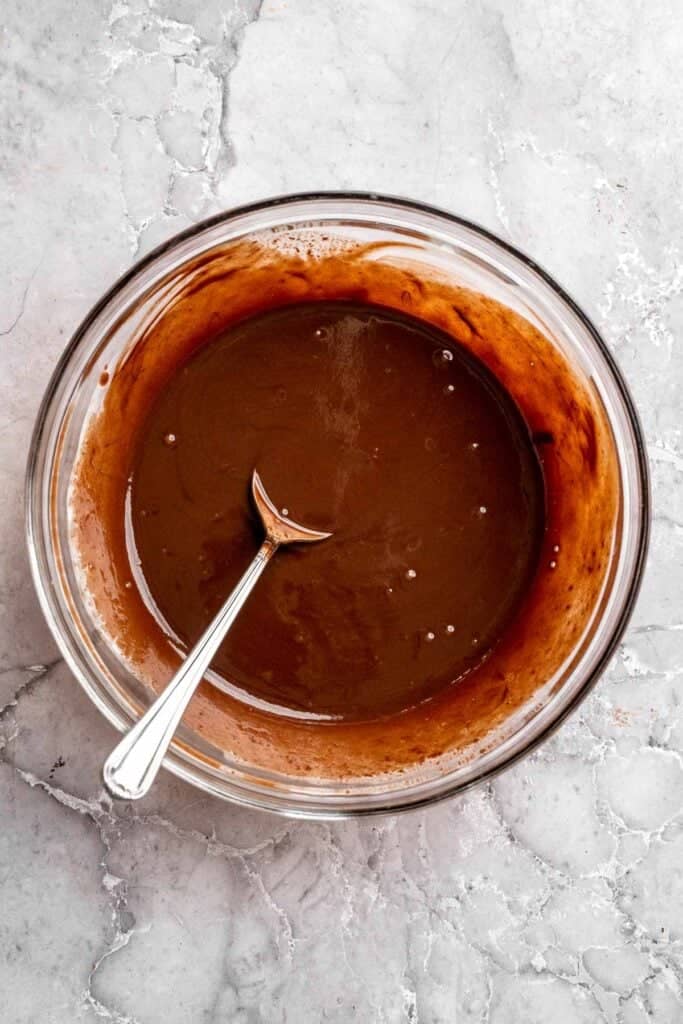 Chocolate mousse cake with rich layers, fluffy mousse, and glossy ganache. Easy, decadent dessert perfect for celebrations and chocolate lovers. | aheadofthyme.com