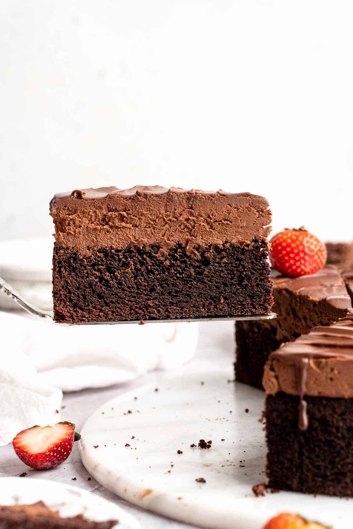 Chocolate mousse cake with rich layers, fluffy mousse, and glossy ganache. Easy, decadent dessert perfect for celebrations and chocolate lovers. | aheadofthyme.com