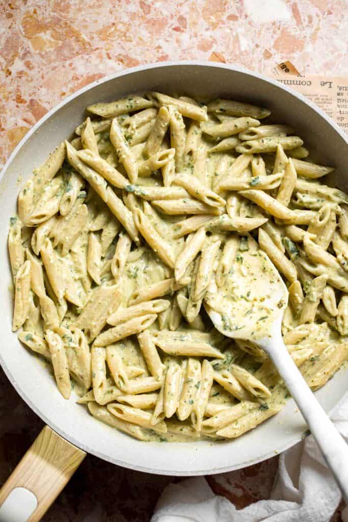 Easy creamy pesto pasta with basil pesto, Parmesan, and garlic. Quick, flavorful weeknight pasta dinner ready in just 20 minutes. | aheadofthyme.com