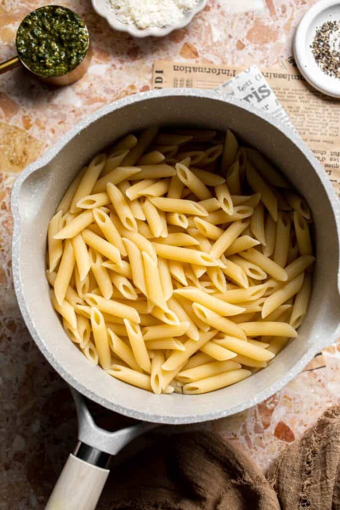 Easy creamy pesto pasta with basil pesto, Parmesan, and garlic. Quick, flavorful weeknight pasta dinner ready in just 20 minutes. | aheadofthyme.com