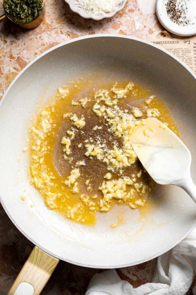 Easy creamy pesto pasta with basil pesto, Parmesan, and garlic. Quick, flavorful weeknight pasta dinner ready in just 20 minutes. | aheadofthyme.com