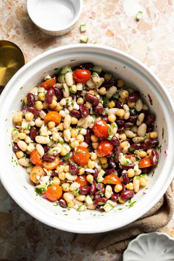 Mediterranean dense bean salad packed with chickpeas, vegetables, feta, and lemon dressing. Healthy meal prep salad full of fresh flavor. | aheadofthyme.com