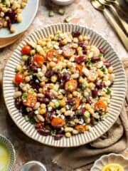 Mediterranean dense bean salad packed with chickpeas, vegetables, feta, and lemon dressing. Healthy meal prep salad full of fresh flavor. | aheadofthyme.com