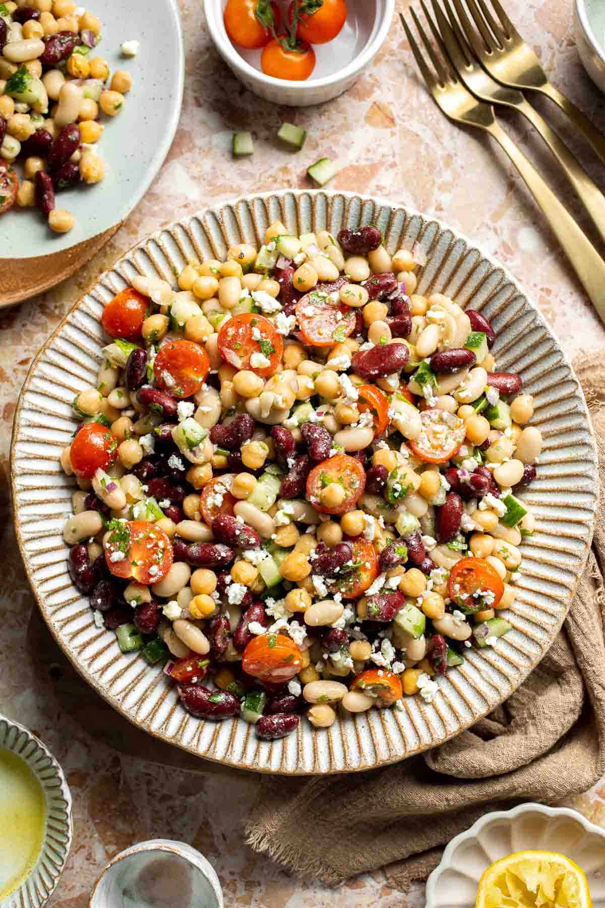 Mediterranean dense bean salad packed with chickpeas, vegetables, feta, and lemon dressing. Healthy meal prep salad full of fresh flavor. | aheadofthyme.com