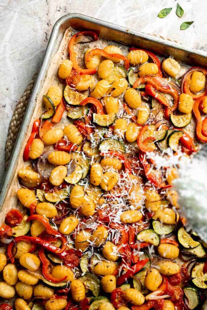 Easy sheet pan gnocchi and vegetables roasted until golden and crispy. A simple one-pan vegetarian dinner ready in 30 minutes. | aheadofthyme.com