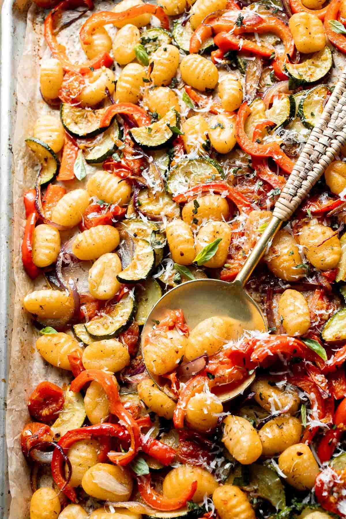 Easy sheet pan gnocchi and vegetables roasted until golden and crispy. A simple one-pan vegetarian dinner ready in 30 minutes. | aheadofthyme.com
