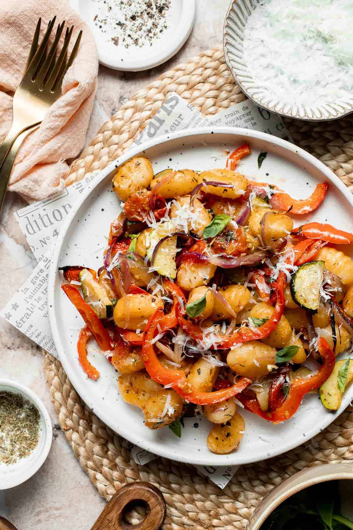 Easy sheet pan gnocchi and vegetables roasted until golden and crispy. A simple one-pan vegetarian dinner ready in 30 minutes. | aheadofthyme.com