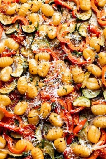 Easy sheet pan gnocchi and vegetables roasted until golden and crispy. A simple one-pan vegetarian dinner ready in 30 minutes. | aheadofthyme.com