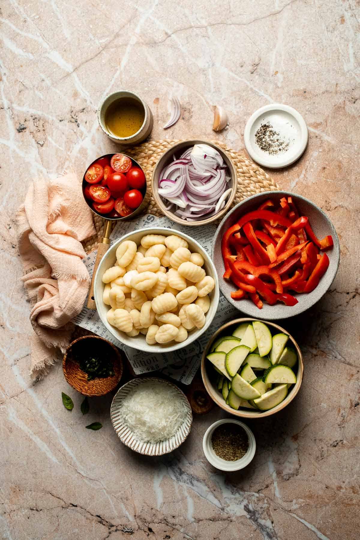Easy sheet pan gnocchi and vegetables roasted until golden and crispy. A simple one-pan vegetarian dinner ready in 30 minutes. | aheadofthyme.com