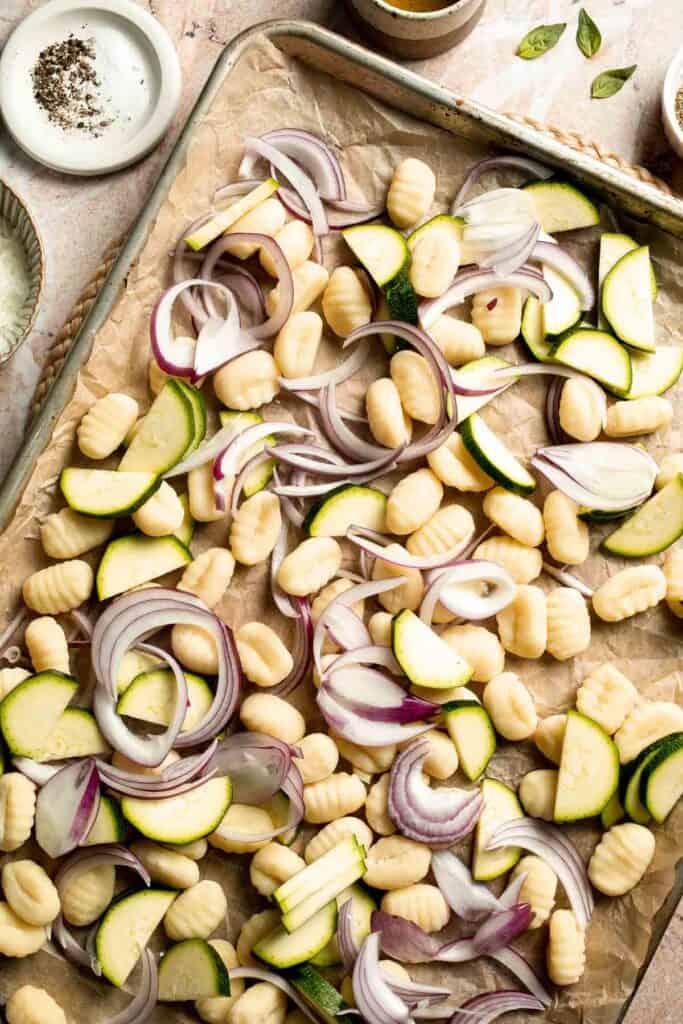 Easy sheet pan gnocchi and vegetables roasted until golden and crispy. A simple one-pan vegetarian dinner ready in 30 minutes. | aheadofthyme.com