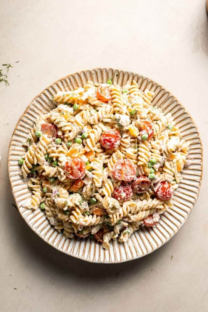 Creamy bacon ranch pasta salad served on a platter.
