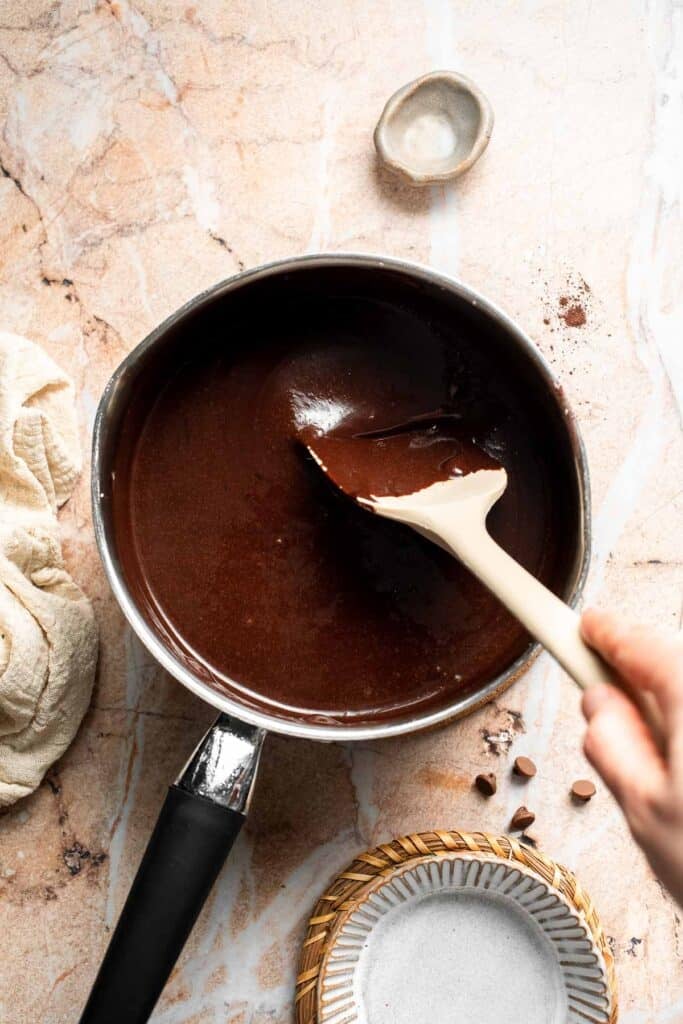 Chocolate mixture stirred until smooth and glossy.