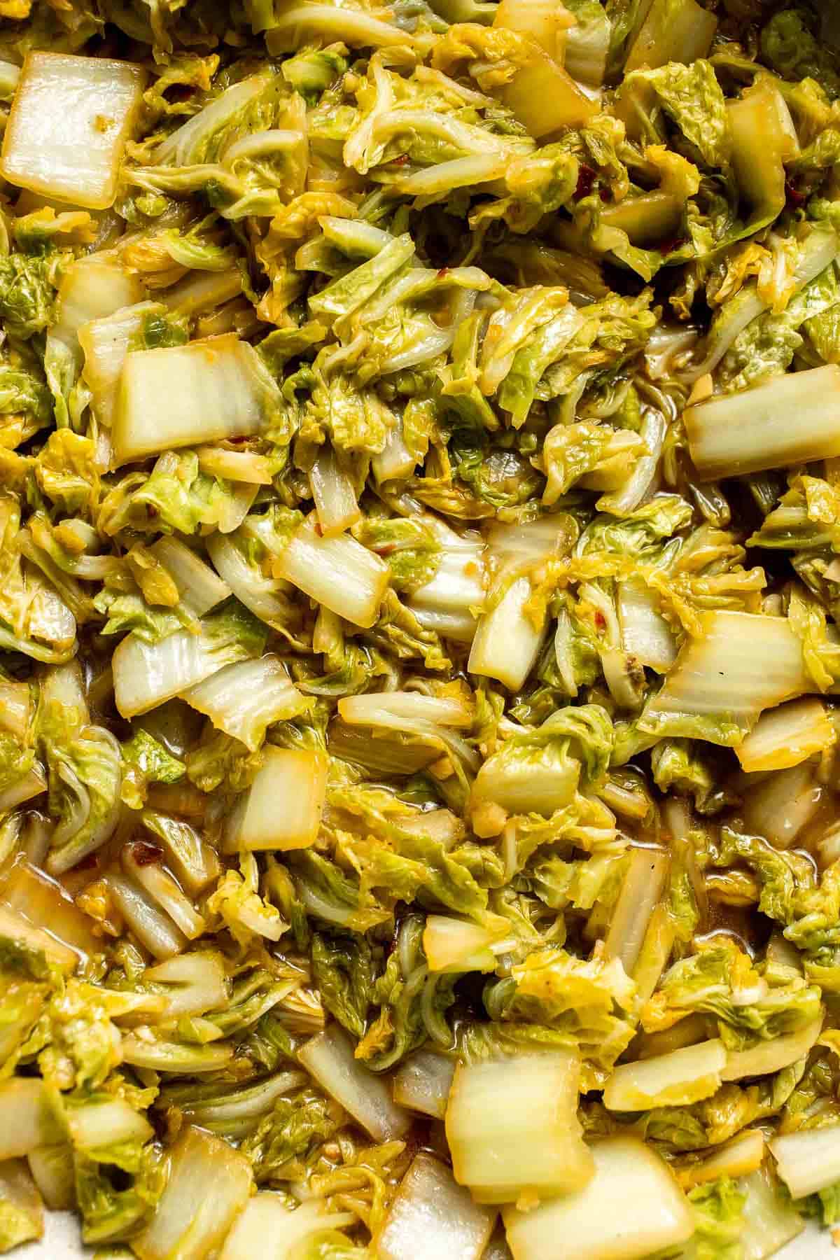Close up of Chinese Cabbage Stir Fry made with Napa cabbage, garlic, soy sauce, and sesame seeds.