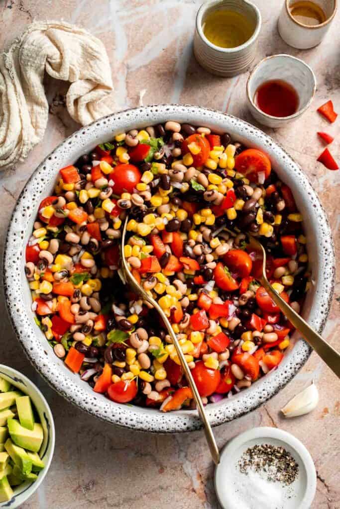 Fresh Cowboy Caviar tossed together in a large bowl before adding the dressing.