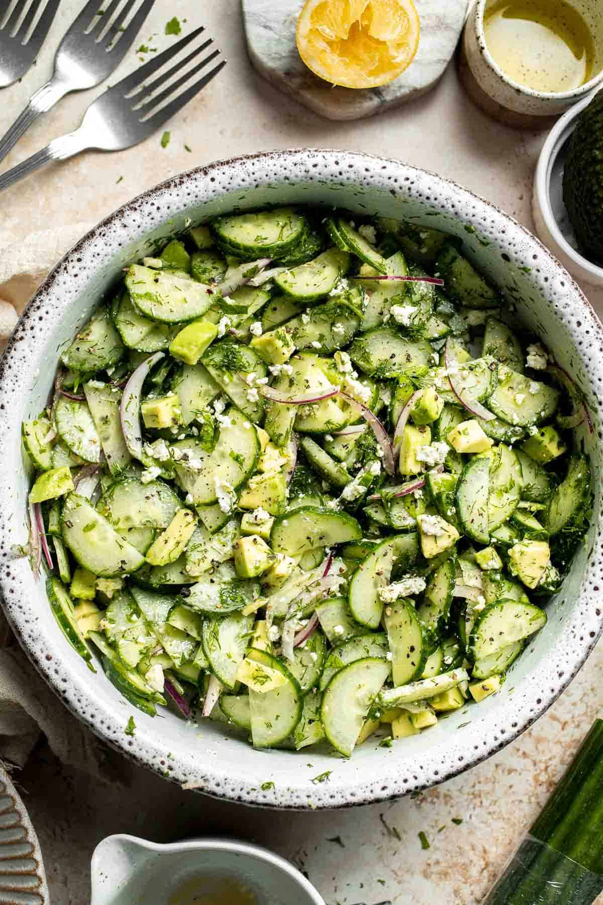 Cucumber Feta Salad with avocado, red onion, fresh dill, and lemon vinaigrette.