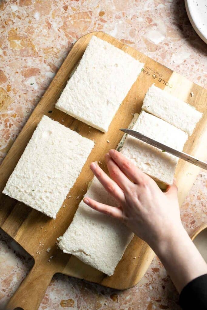 Cucumber Tea Sandwiches cut into small rectangular finger sandwiches.