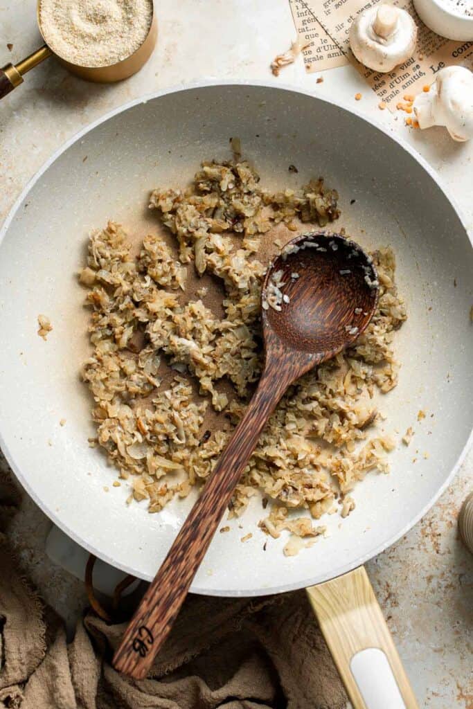 Cooked mushroom and onion mixture sautéed until golden and dry.