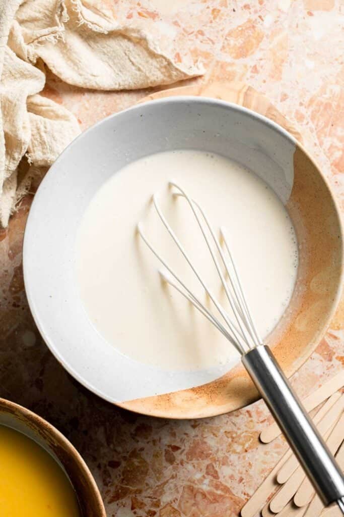 Smooth vanilla cream mixture made with Greek yogurt and heavy cream.