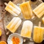 Homemade Orange Creamsicles with creamy orange and vanilla swirls.