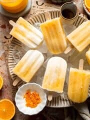 Homemade Orange Creamsicles with creamy orange and vanilla swirls.