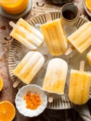 Homemade Orange Creamsicles with creamy orange and vanilla swirls.