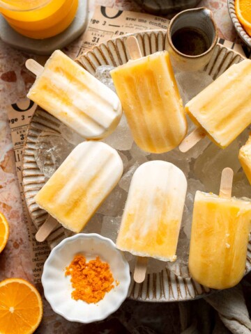 Homemade Orange Creamsicles with creamy orange and vanilla swirls.