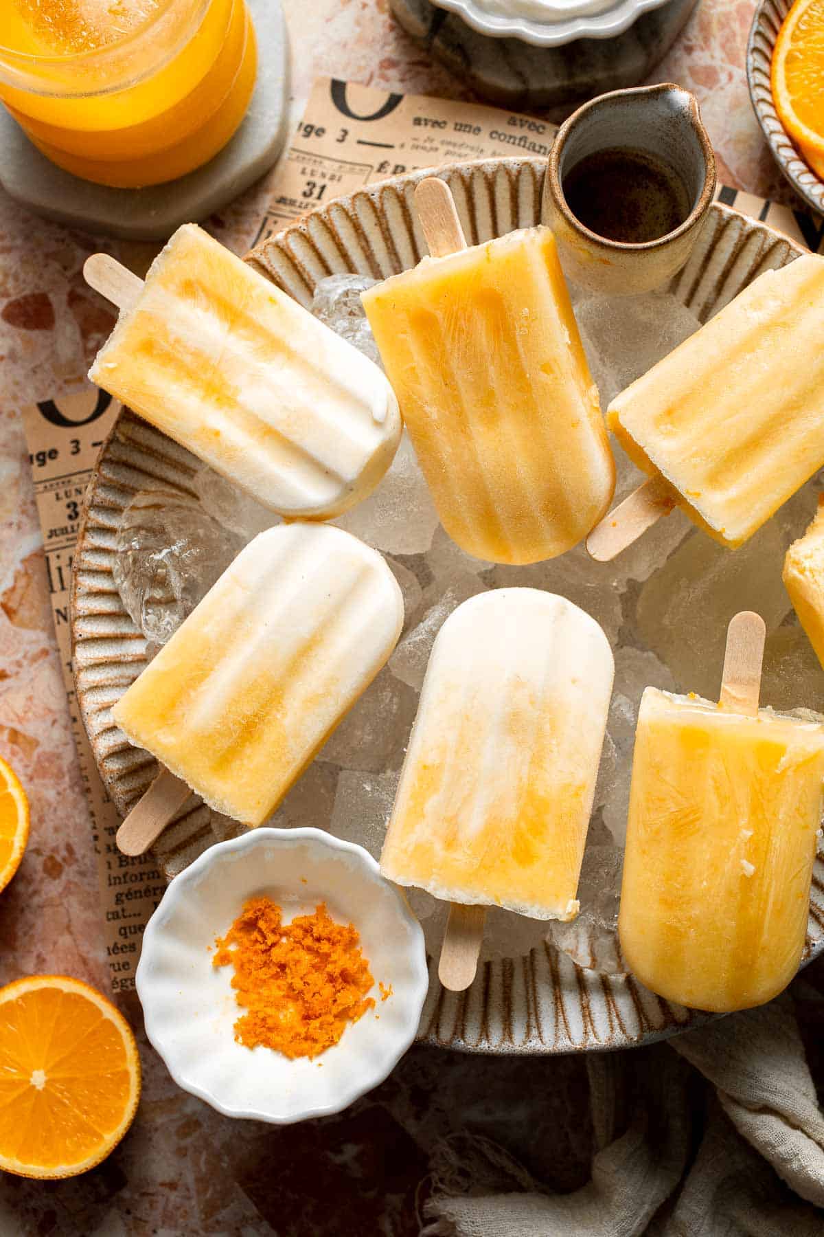 Homemade Orange Creamsicles with creamy orange and vanilla swirls.