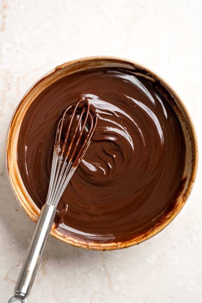 Silky chocolate ganache ready to pour into the graham cracker crust.