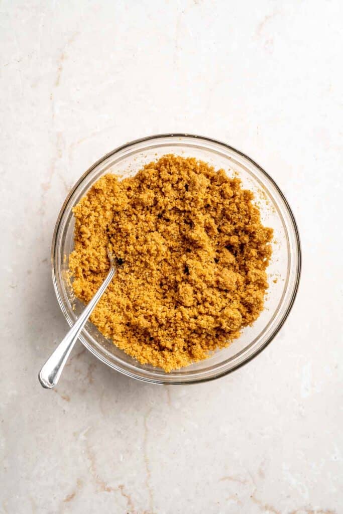 Graham cracker crumbs mixed with melted butter and sugar for the S'mores Pie crust.