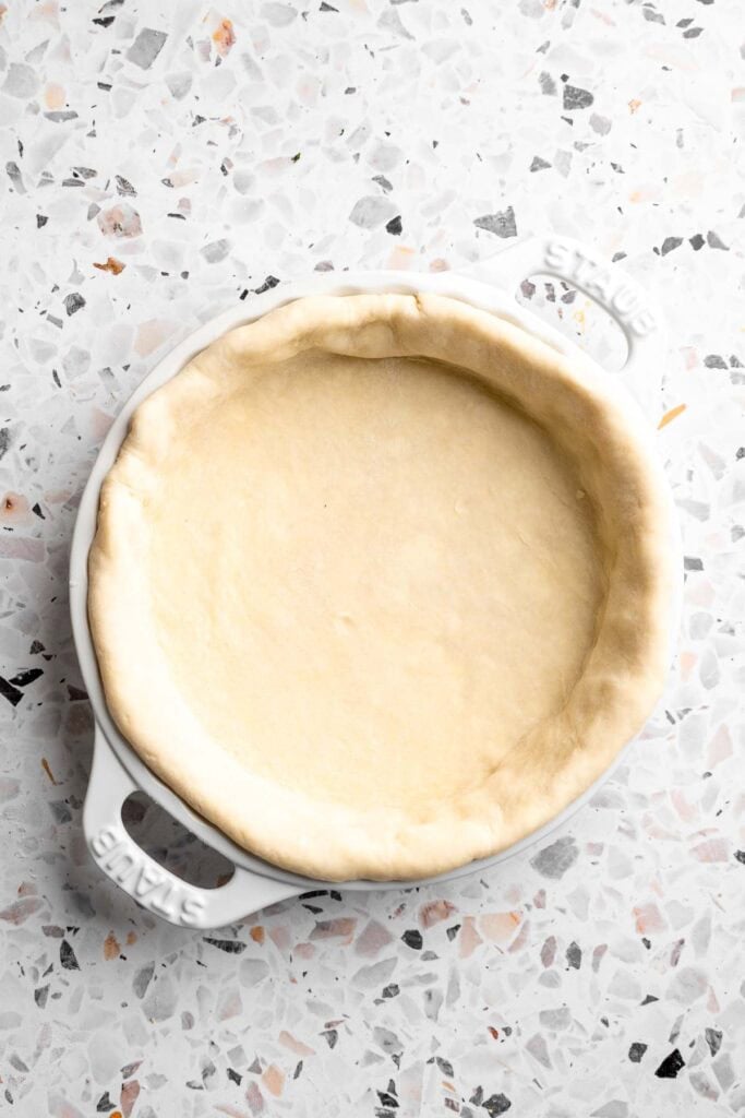 Unbaked pie crust shaped in a pie dish