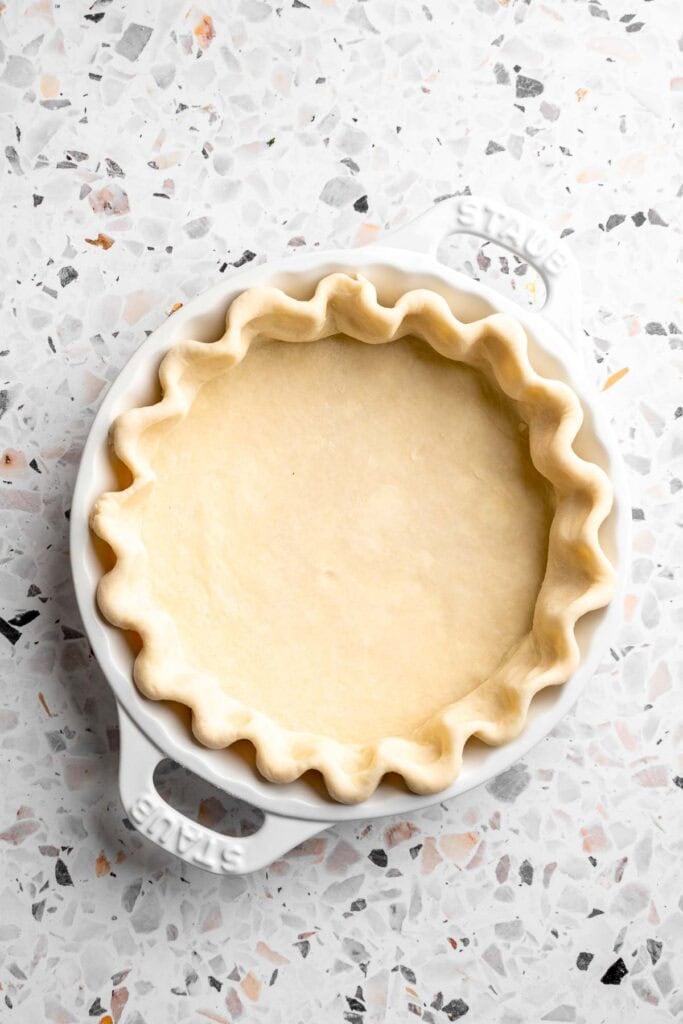 Crimped, unbaked pie crust ready for filling
