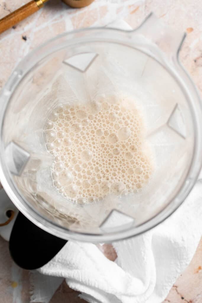 Smooth banana mixture blended in a blender