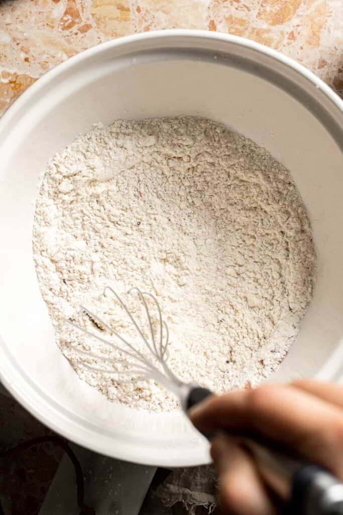 Whisking the dry ingredients together for the beer batter.