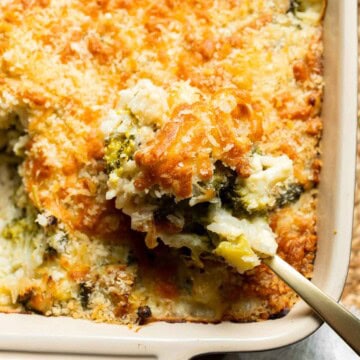 Close-up of the golden, crispy panko and cheddar topping on baked broccoli rice casserole