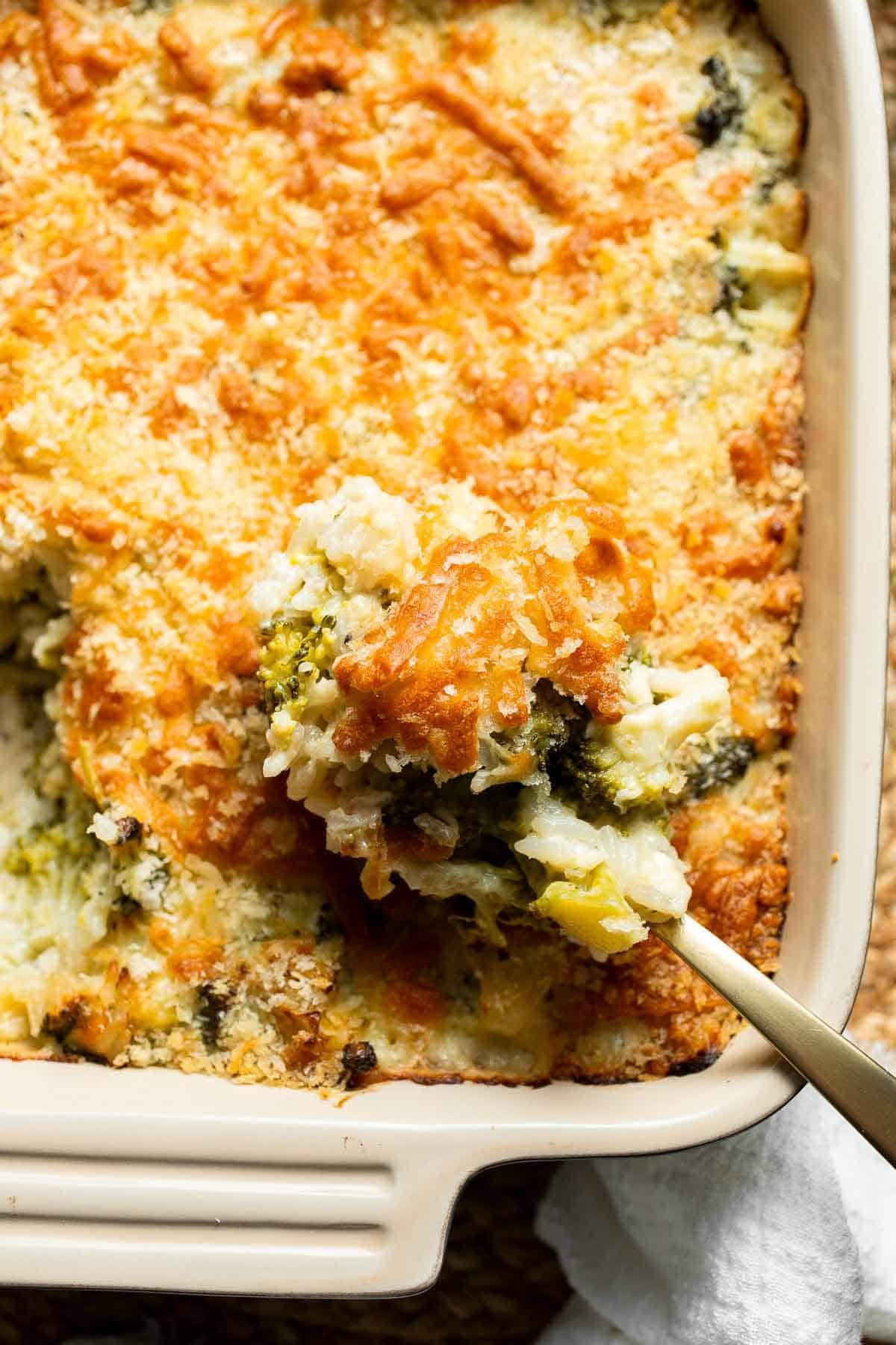 Close-up of the golden, crispy panko and cheddar topping on baked broccoli rice casserole