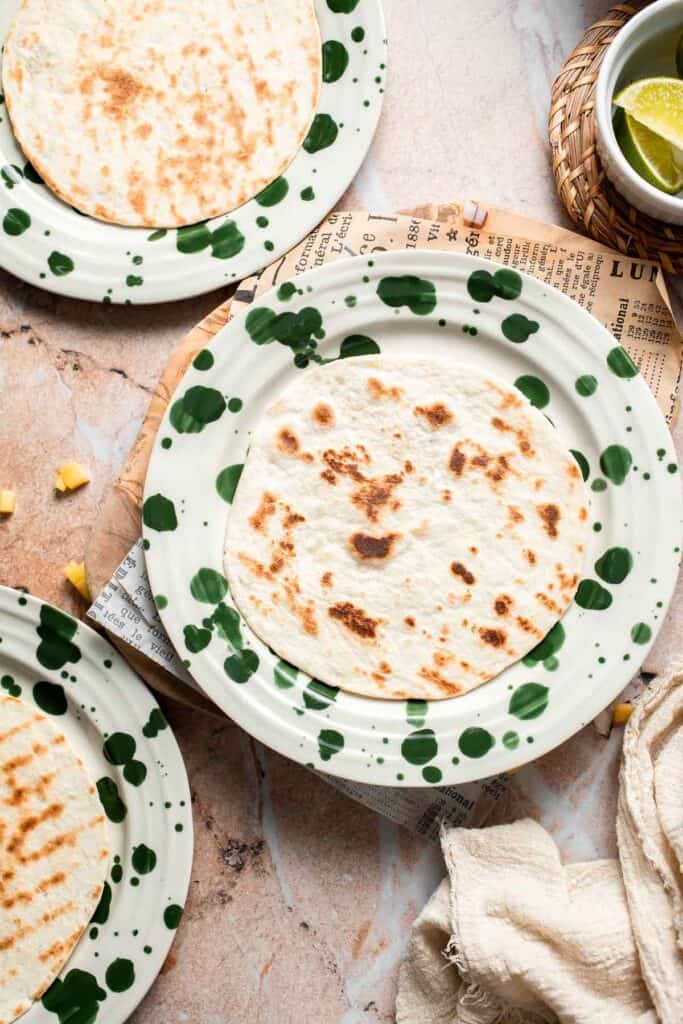 Warm tortilla ready for assembling tacos.