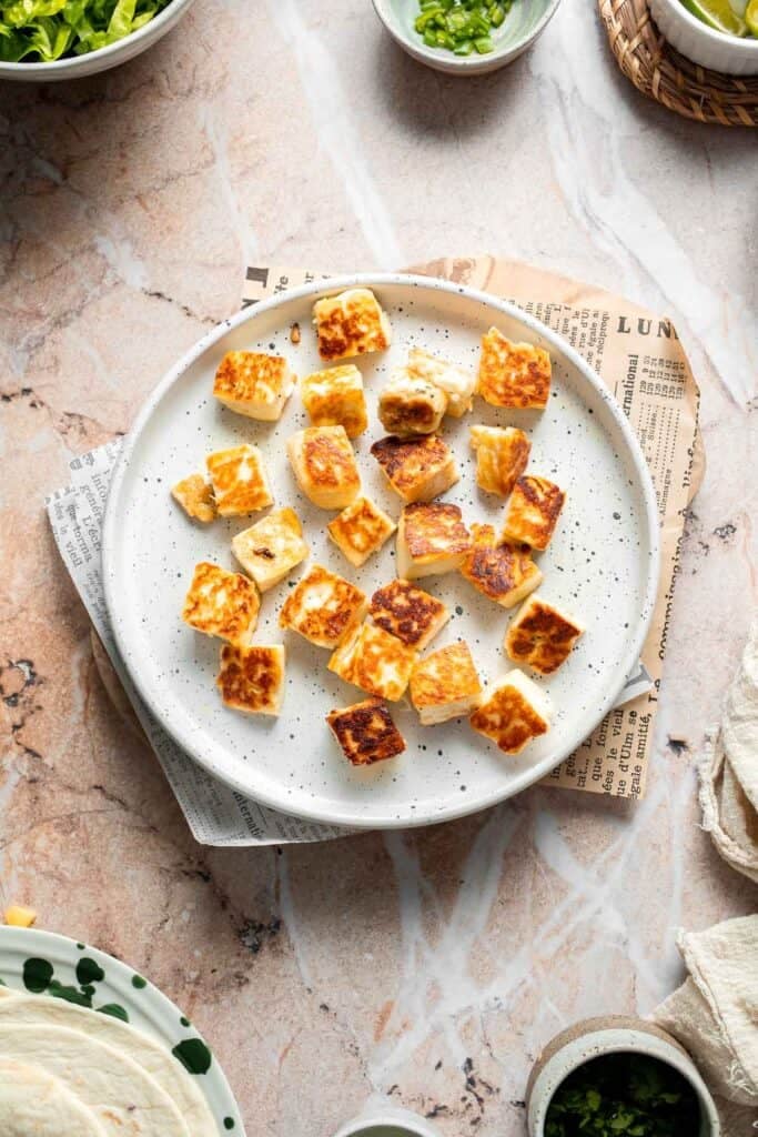 Cooked halloumi cubes ready for tacos.