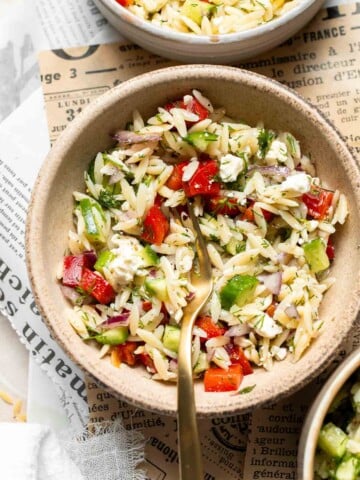 Lemon Orzo Salad with cucumber, red bell pepper, red onion, feta cheese, fresh dill, and lemon dressing.
