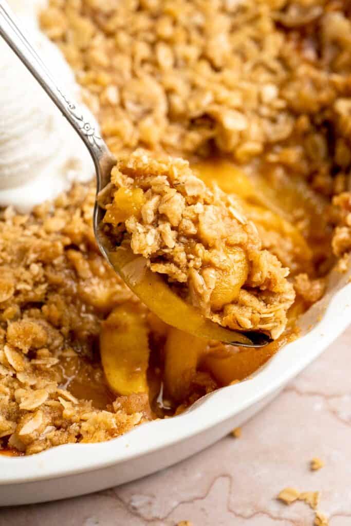 Peach Crisp with a golden crumble topping and juicy peach filling.
