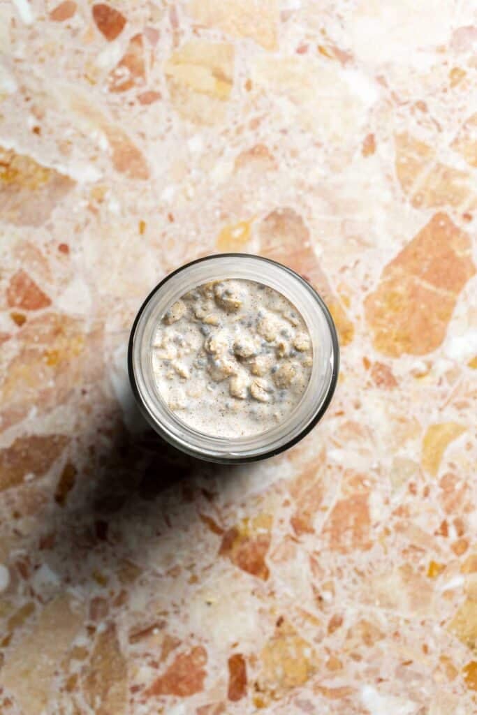Overnight oats mixture thickened in a glass jar after chilling