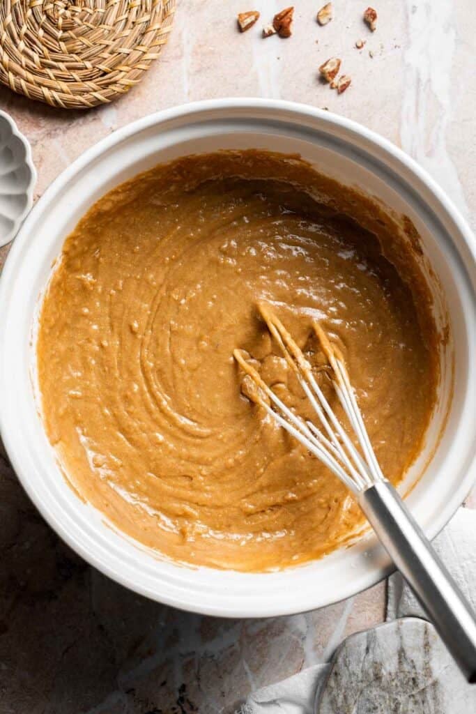 Muffin batter whisked until just combined in a bowl