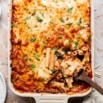 Baked vegetarian ziti with melted, golden brown cheese on top