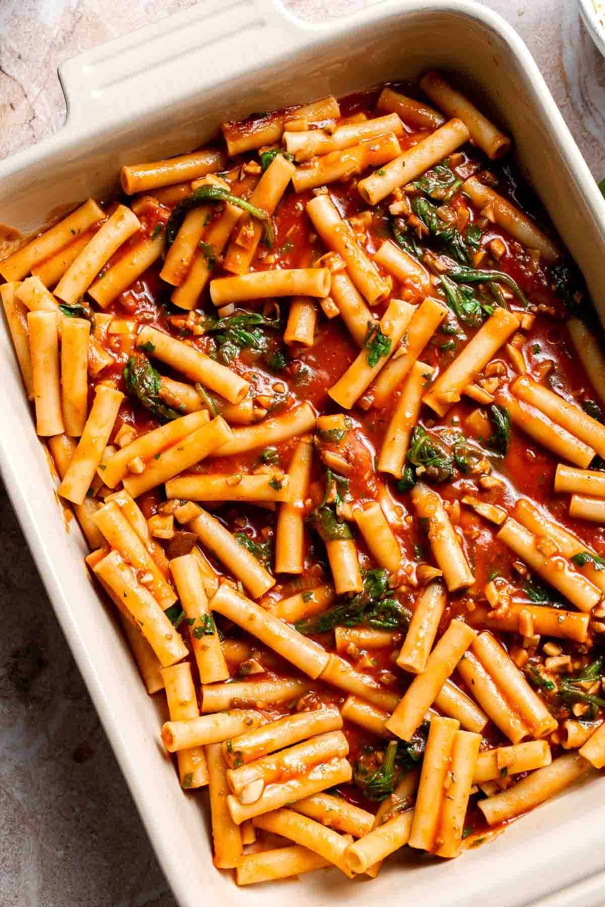 Pasta mixture spread into a baking dish